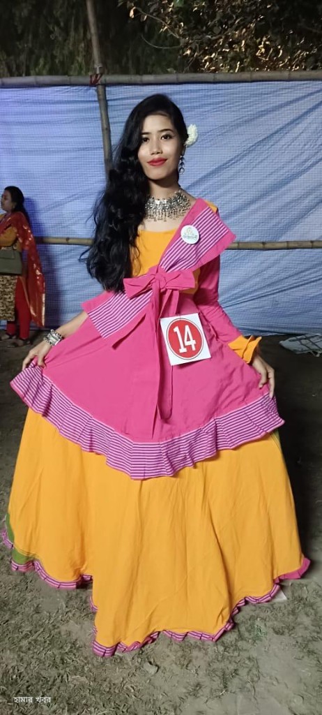 Pageant contestant in pink and yellow custom outfit