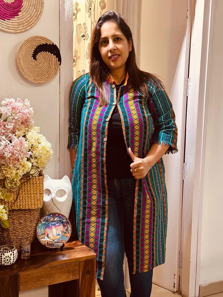 Client giving a thumbs up in a gamcha-pattern shrug