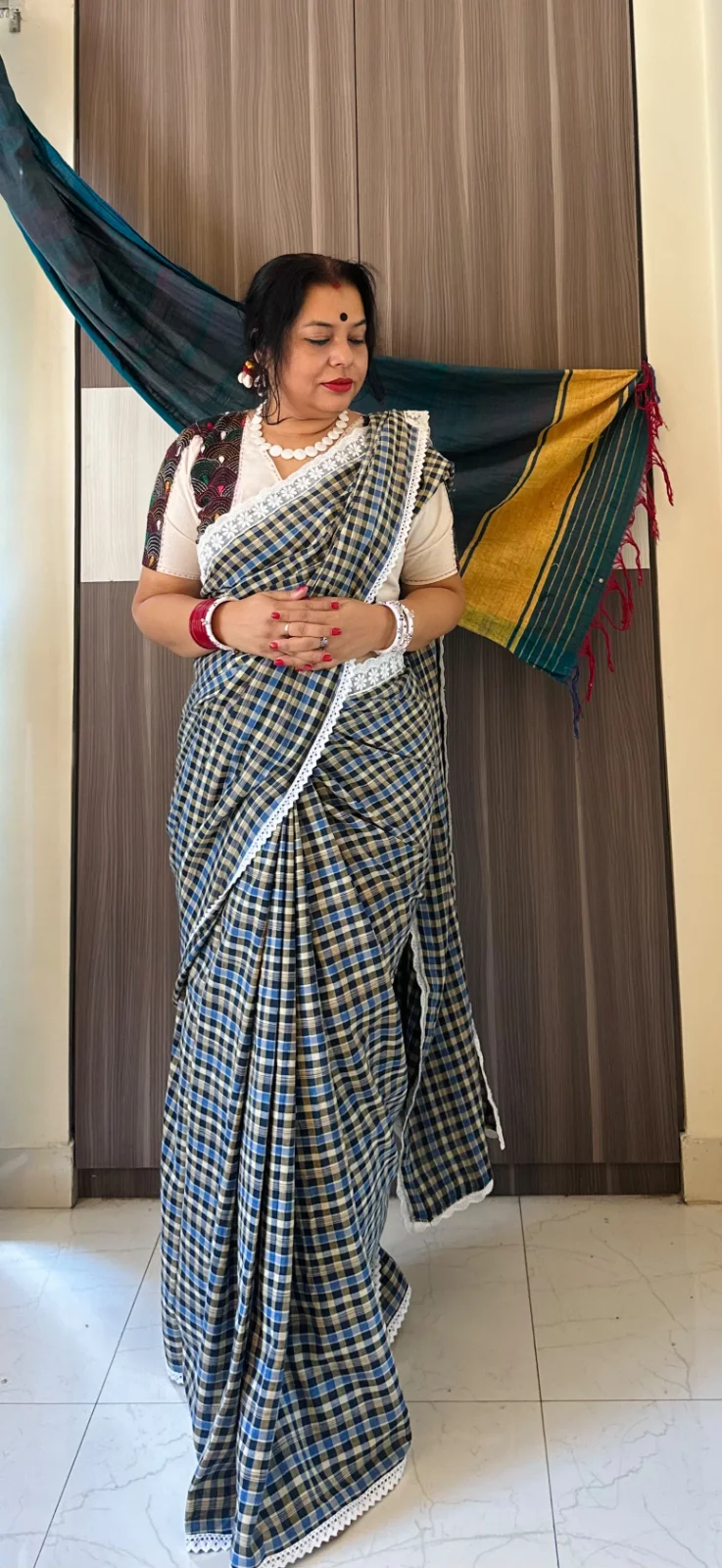 Handloom check saree with lace border . — alternate view