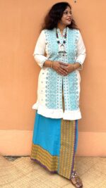 Presenting this set of dokhona wrapped skirt teamed up with a karbi fabric jacket
