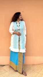 Presenting this set of dokhona wrapped skirt teamed up with a karbi fabric jacket - Image 3