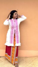Presenting this set of dokhona wrapped skirt teamed up with karbi fabric jacket - Image 2